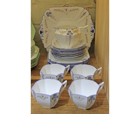 A Shelley Blue Iris 19 piece part tea set no 11561 comprising 4 cups, 1 cream jug, 7 saucers, 6 small plates and 1 large plat