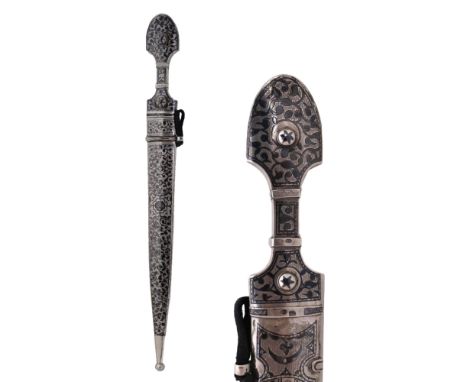 Ca. early 20th century AD. Silver mounted dagger with hilt and scabbard decorated in chiseling niello, straight double-edged 