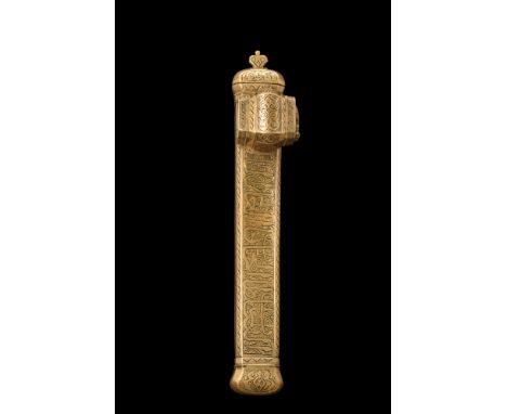 Ca. 19th century AD. A brass pen case with an attached inkwell. The slender, elegant form of the pen case features rounded fi
