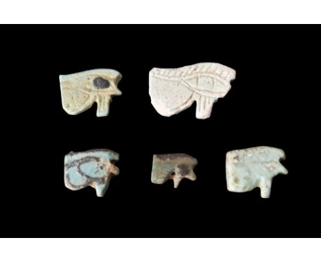Ca. 664-30 BC. A group of well-defined wedjat eyes, with fine details, notched eyebrows. The amulet is horizontally pierced f