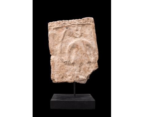 Ca. 1st millennium BC. A stone block fragment with incised characters in Ancient South Arabian script to the top edge and a w