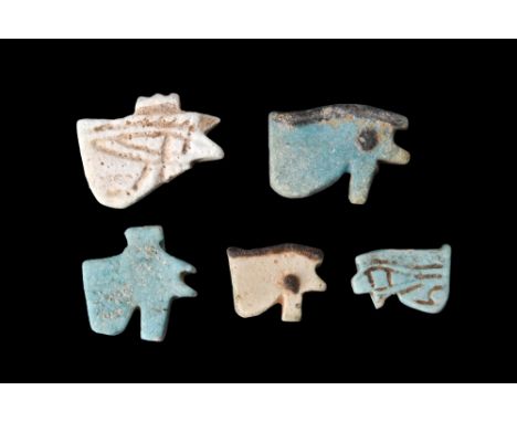 Ca. 664-30 BC. A selection of five uzat amulets, also referred to as eye of Horus or Wedjat-eye amulets, with fine details an