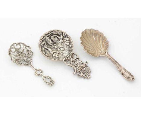 A continental silver cast caddy spoon, with a galleon terminal, London hallmarks for 1916; a late 18th Century Dutch silver c