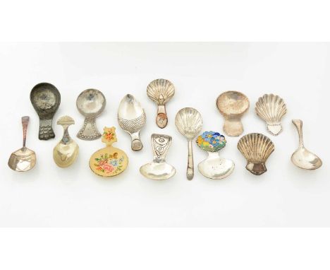 A quantity of electroplated Old Sheffield plated, one painted brass, and one pewter caddy spoons, the largest one 9cms long. 