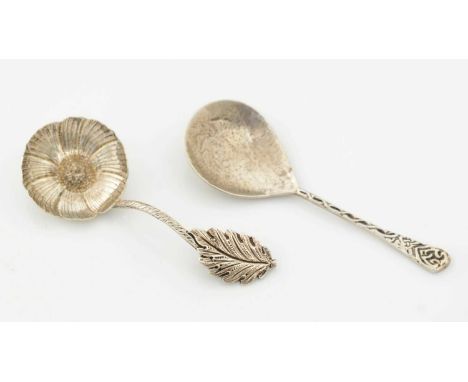 A late Victorian silver naturalistic caddy spoon in the form of a flower, with a leaf terminal, by Chaplin and Sons, London 1
