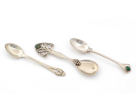 A handmade silver caddy spoon with a "fanned", turquoise-set terminal, unmarked; and two silver teaspoons, the former 12.5cms