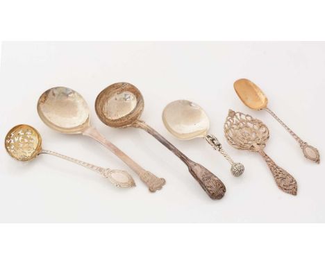 A Victorian silver matching sugar sifter ladle and sugar spoon, by George Unite, Birmingham 1875; a cast silver sifter spoon;