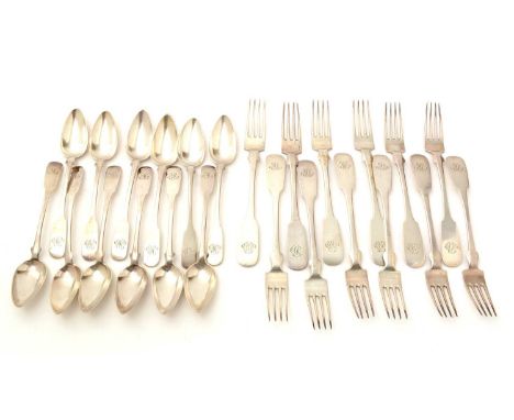 A part set of early 19th Century German silver flatware, fiddle-pattern, to include: twelve table forks and twelve dessert sp