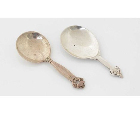 A George V silver caddy spoon, by Liberty &amp; Co, Birmingham, 1927; and a Danish silver Cactus pattern caddy spoon, by Geor