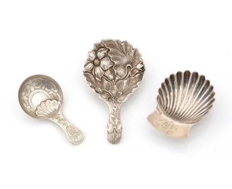 A George III small silver caddy spoon with engraving and a round bowl, stamped with a shell motif, initialled, by John Lawren