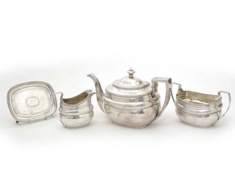 A George III silver four-piece tea service, to include: teapot and stand, sugar basin and milk jug, each inscribed underneath