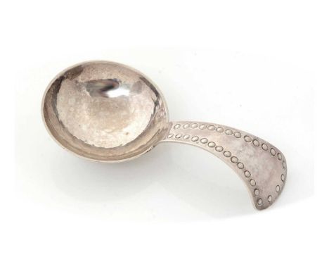 A George V silver handmade caddy spoon, with a round bowl and punched beading around the stem, by the Keswick School of Indus