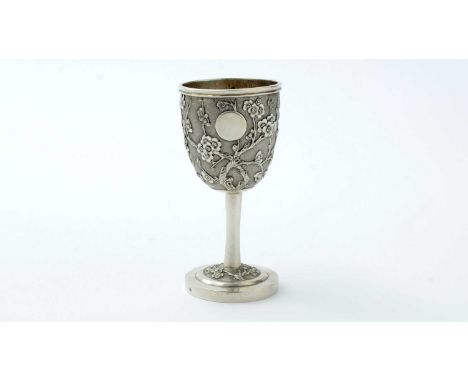 A late 19th century Chinese silver goblet, chased with prunus on the vacant circular cartouche, against a matt ground, no app