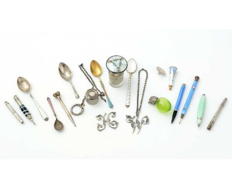 A mixed lot including: a 20th Century novelty silver pencil, in the form of a golf tee; a modern silver golf ball marker; a c