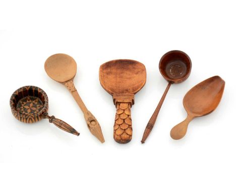  Wooden caddy spoons: a Tunbridge Ware ladle; a treen ladle; a Welsh example with a carved loose ball in the handle; and two 