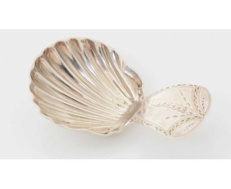 A George III silver caddy spoon, with scalloped steel bowl and a bright-cut lug handle, by John Priestman, London 1790, 7.4cm