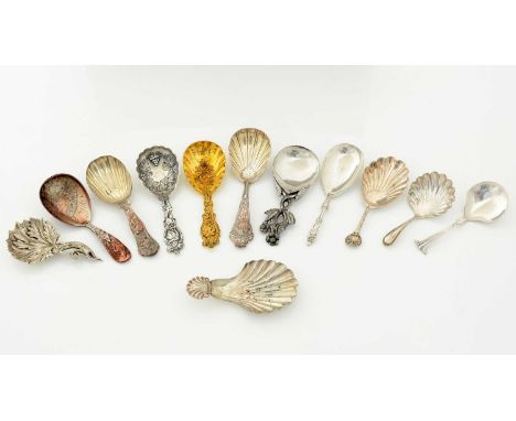 Twelve various Victorian electroplated caddy spoons (including a gilt example, an engraved aesthetic example, and a stag hunt