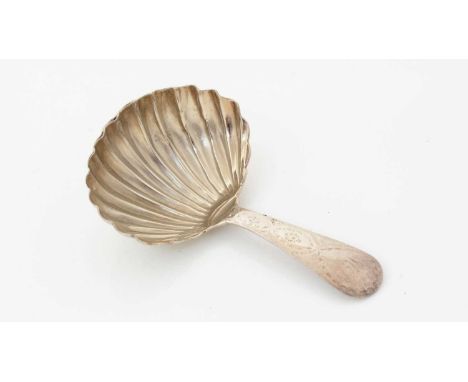 A George III Scottish provincial silver caddy spoon, with an engraved stem and a fluted bowl, initialled, and struck with two