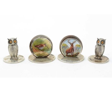Two Edwardian silver and enamel menu card holders,  of disc form, one with a stag and one with a snipe on the front, by J. C.