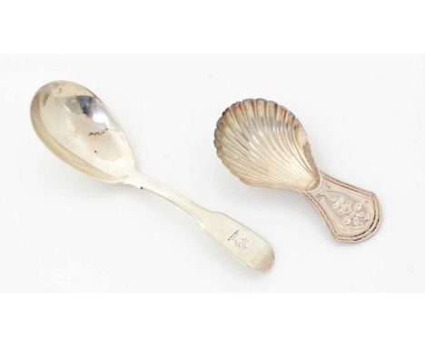 A Victorian silver provincial fiddle-pattern caddy spoon, crested by J. Barber and W. North, York, 1842; and a Sheffield-made