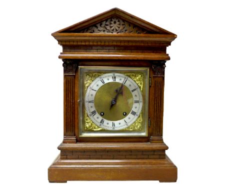 An oak mantel clock striking on two gongs, the back plate stamped W&amp;H Sch, 31 by 19 by 41cm high.