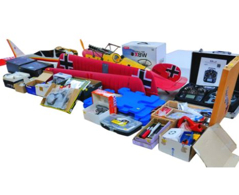 A collection of remote control aircraft and accessories, including a bi-plane with 124cm wingspan, two remote control aircraf