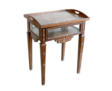 A Syrian Damascus tray top vitrine, side table, circa 1900, the lift off twin handled tray top inlaid with mother of pearl, e
