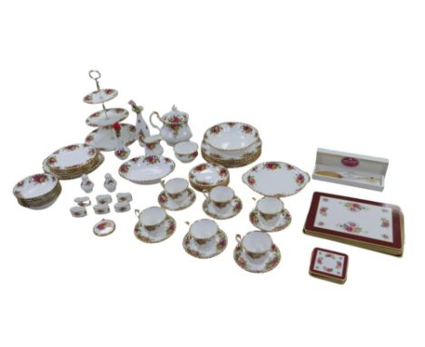 A Royal Albert part dinner and tea service, decorated in the Old Country Roses pattern, with over fifty pieces, as well as so