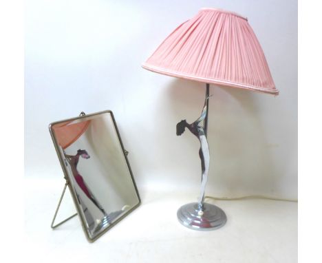 An Art Deco style chrome lamp with lady, together with a folding shaving mirror. (2)