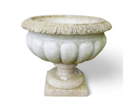 A lobed marble urn / planter on square base, egg and dart rim, 61 by 50cm high.