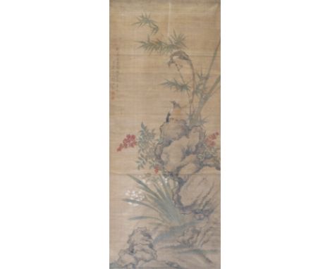 A hand painted Chinese scroll, probably 19th century, showing a pair of long-tailed exotic birds, bamboo, berries, rocks and 