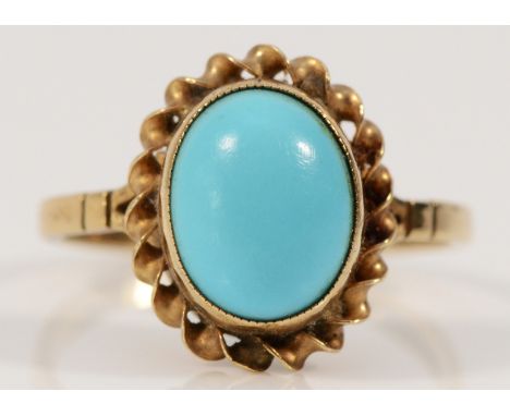 A 9ct gold turquoise dress ring, 13mm ring front, K 1/2, 1.8g