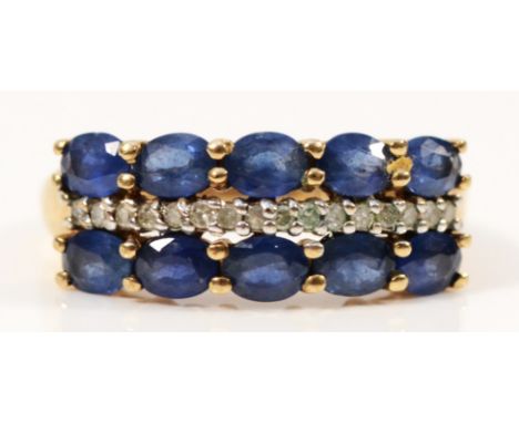 A 9ct gold diamond and sapphire three row ring, O, 3.3g