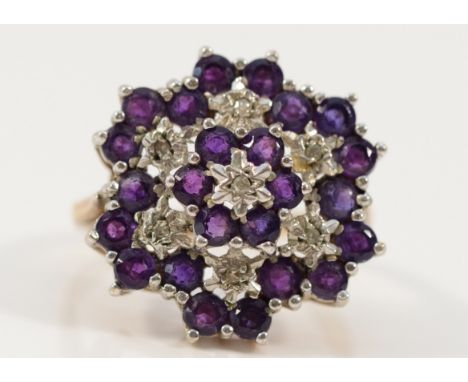 A 9ct gold amethyst and diamond cluster cocktail ring, 18mm ring front, P, 4.6g