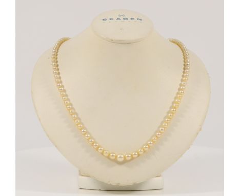 A .900 platinum and diamond clasp vintage cultured pearl necklace, 12g