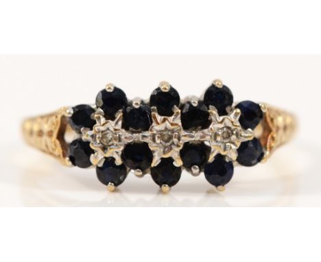 A 9ct gold vintage sapphire and diamond cluster ring, misshapen band, K 1/2, 2.1g