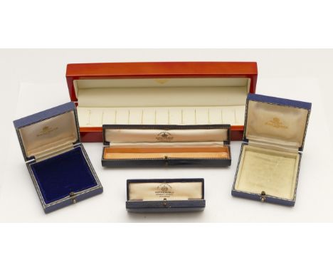 Four vintage Mappin &amp; Webb jewellery boxes and a wooden 12 ring box.