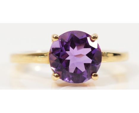A 10k gold amethsyst solitaire ring, 9mm amethyst, N, 2.6g