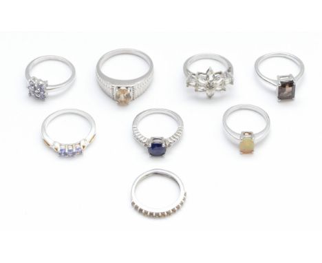 Eight silver and gemset rings, to include opal and tanzanite, L - W, 27gm