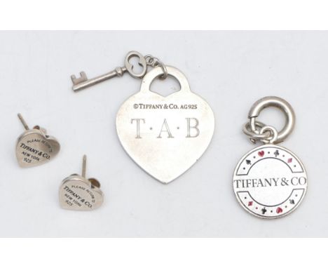 Tiffany &amp; Co. a silver and enamel Las Vegas gambling token, a heart pendant and a pai of ear studs, 11gm