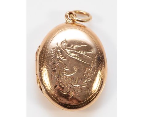 A 9ct gold vintage oval locket, engraved with a lovebird and forget me not, Birmingham 1864, 20mm locket length, 2.9gthe leng