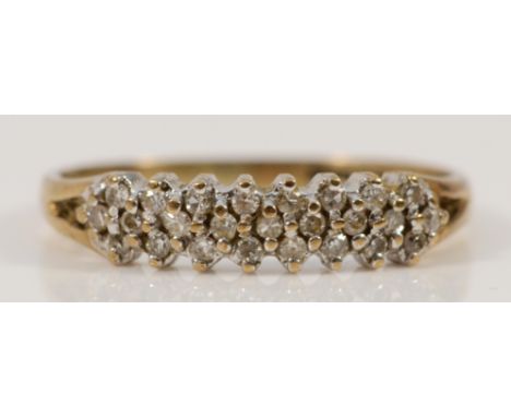 A 9ct gold brilliant cut diamond three row ring, London 1990, L 1/2, 1.3g