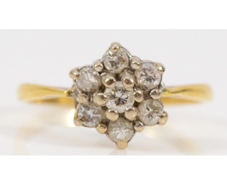 An 18ct gold and brilliant cut diamond cluster ring, approximately 0.50cts, K, 2.7gm