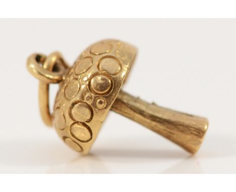 A 9ct gold vintage charm in the shape of a mushroom, 12mm length, 2.6g