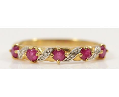 A 9ct gold ruby and diamond twist half eternity ring, P, 2g
