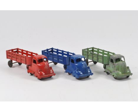 Marx Articulated Truck Trio. Green and Red Issues are original. Blue is Restoration. Generally A/B to D. (3)
