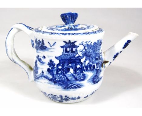 A Chinese blue and white porcelain teapot, with double strap work handle, floral knop and plain spout, the body heavily decor