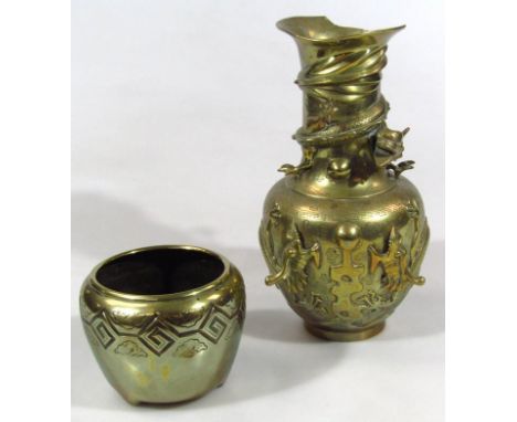 A Xuande style polished bronze style Chinese vase, of shaped outline with raised dragon and geometric motif on circular foot,