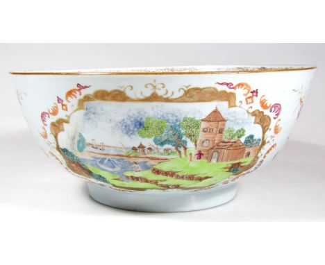 An early 19thC Chinese porcelain punch bowl, of circular outline, polychrome decorated with an inner scroll border, the exter