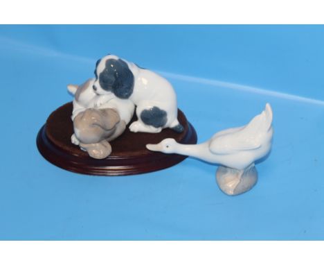 TWO NAO FIGURES - PUPPIES AND A GOOSE